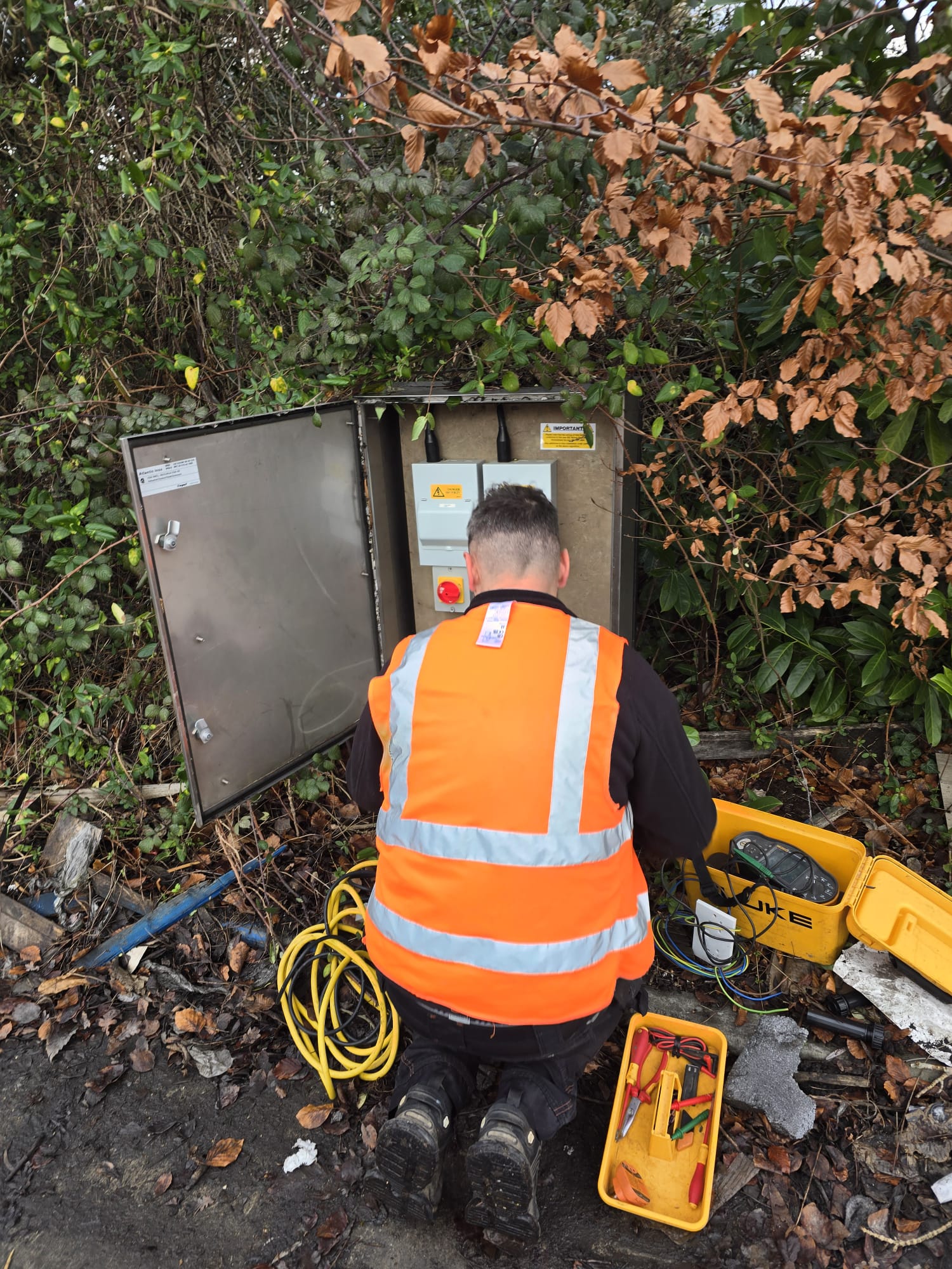 Engineer working on electrical cabinet