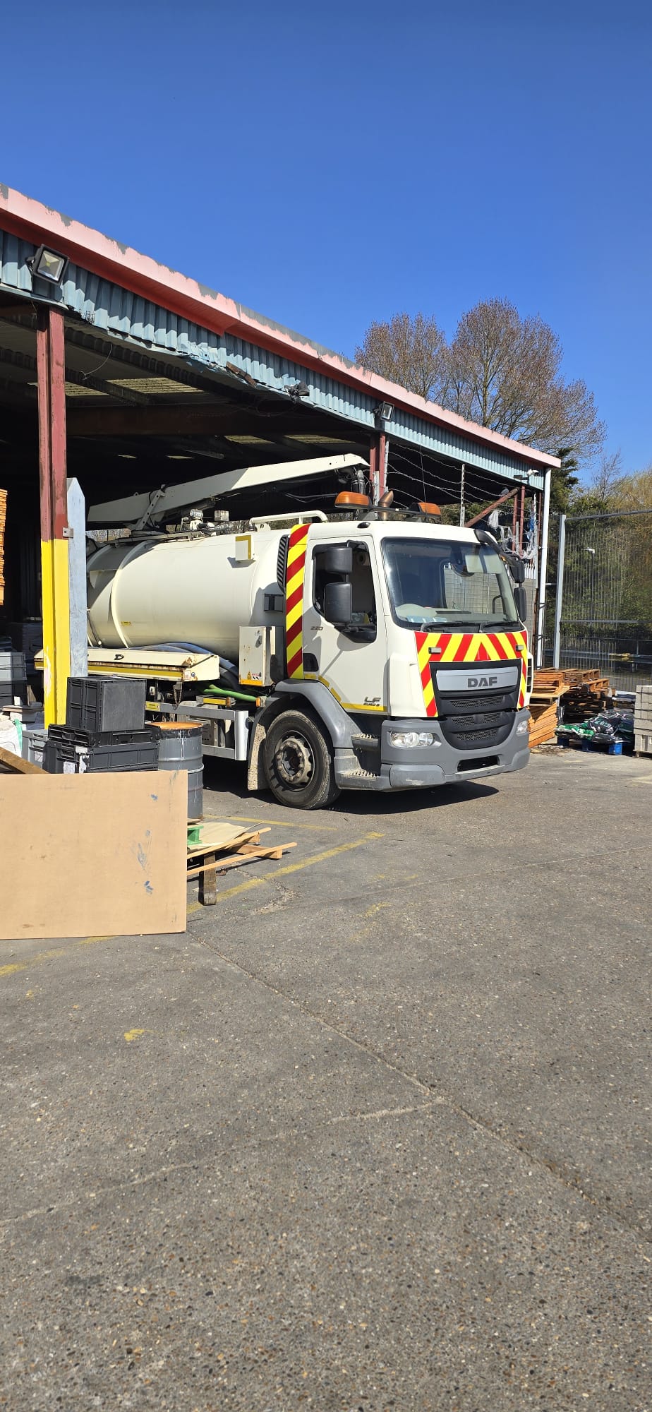 DAF vacuum tanker at builders' merchant yard