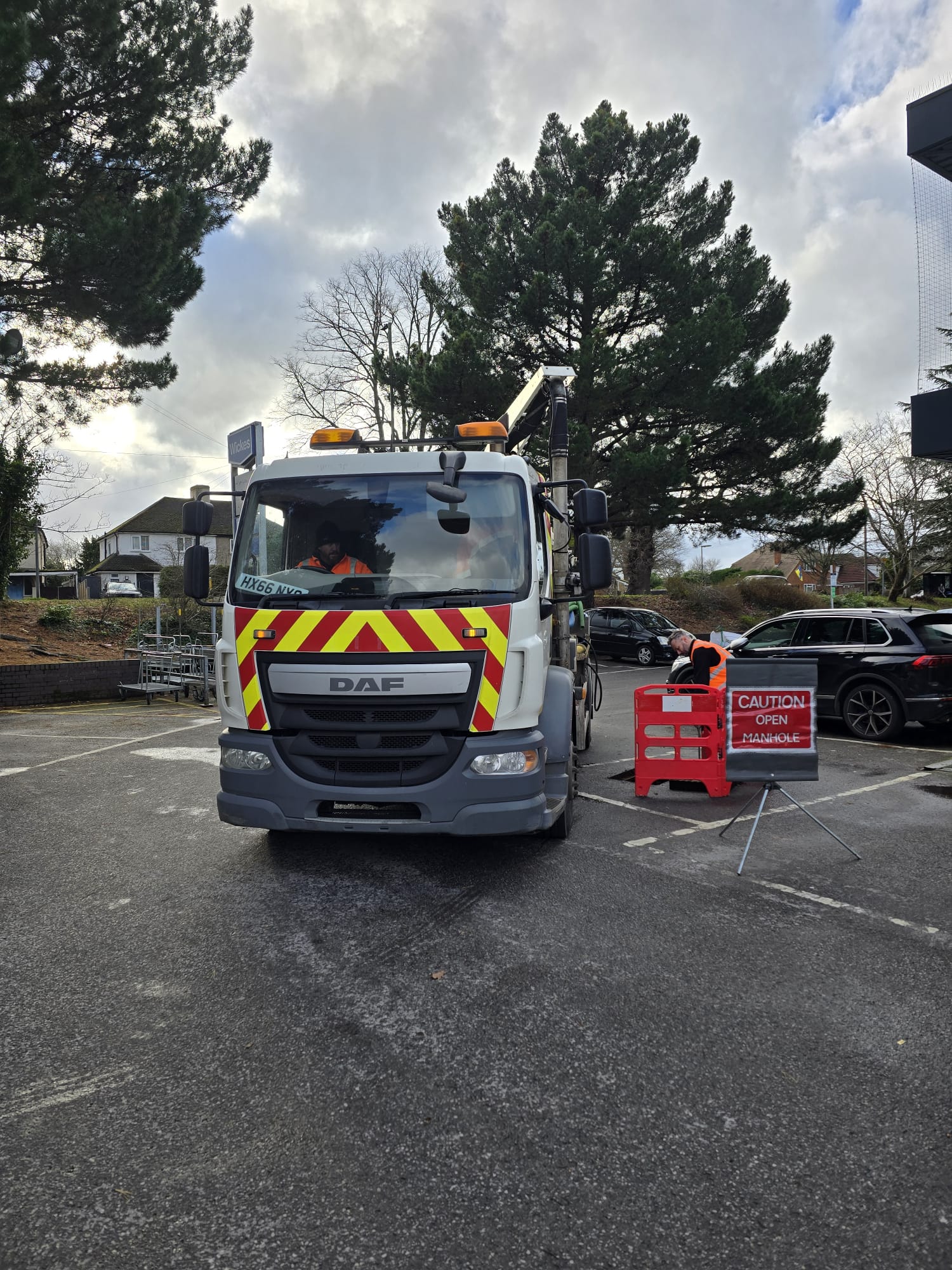 Tanker on site at open manhole job